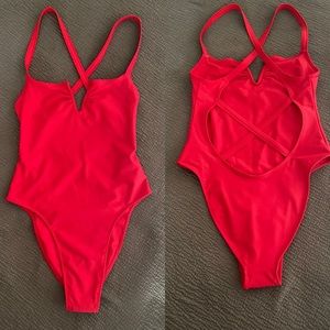 One piece red swimsuit. Never worn.